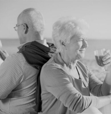 time-to-relax-on-the-beach-senior-couple-in-the-beach-retirement-and-summer-vacation-concept-scaled-1